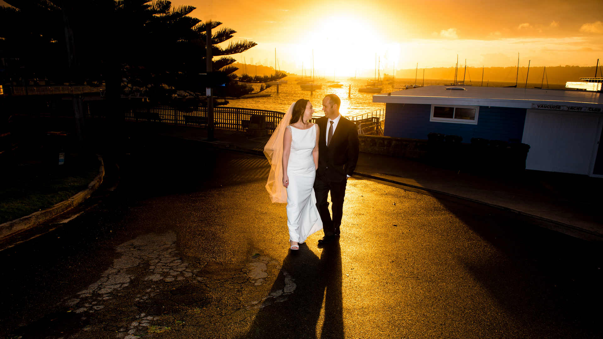Bride and Groom walking in sunset