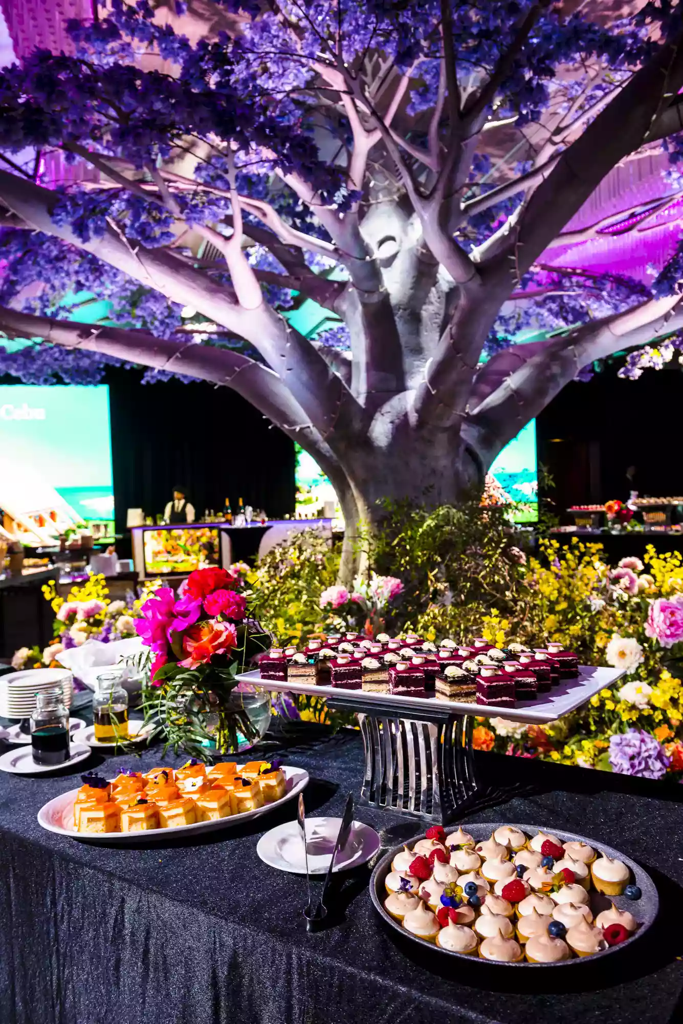 shangri la showcase event big indoor tree with desert buffet surrounds as shot by Sydney event photographer