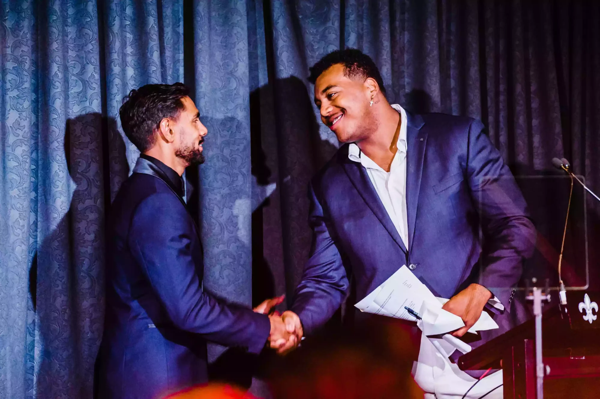 indigenous man receiving an award