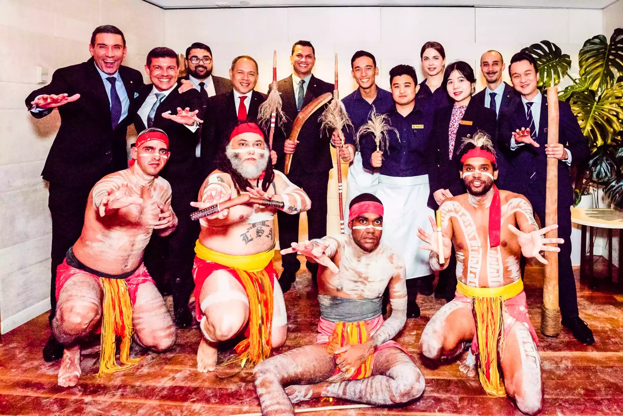 photo of a group of people and an aboriginal dance group at a Sydney event as captured by a sydney event and award photographer
