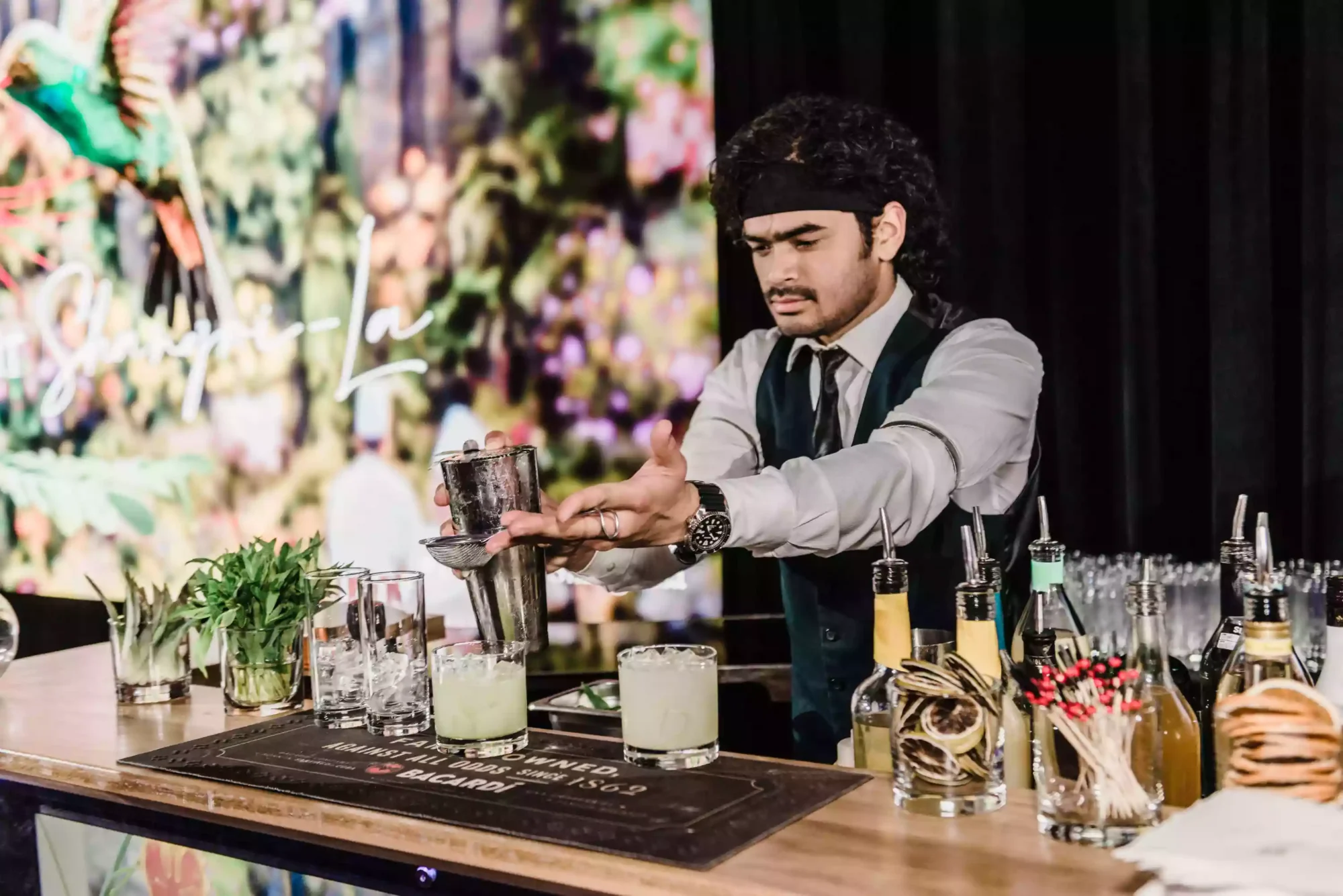 photo of a barman making cocktails at a Sydney event as captured by a sydney event and award photographer