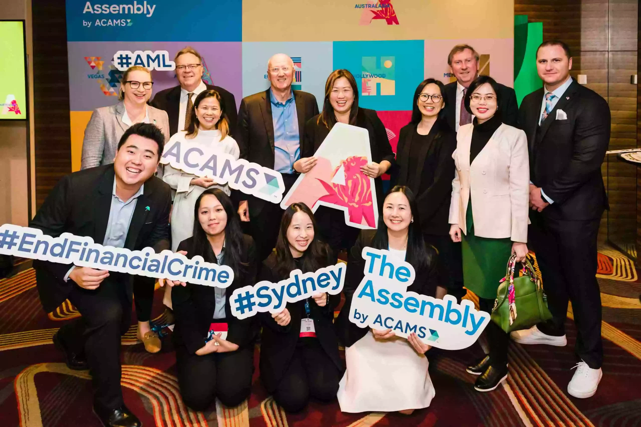 attendess at a sydney conference in group photo photographed by a sydney event and conference photographer