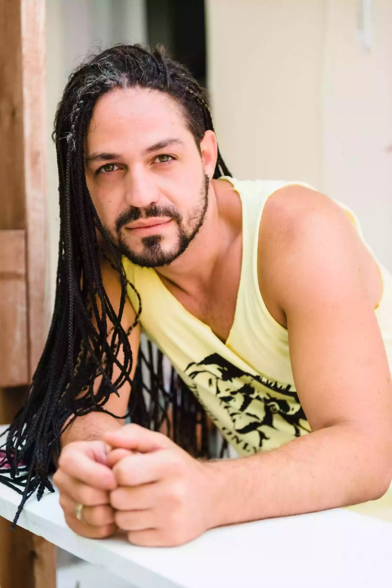 Headshot photo of a man with long hair as shot by a Sydney professional headshot photographer